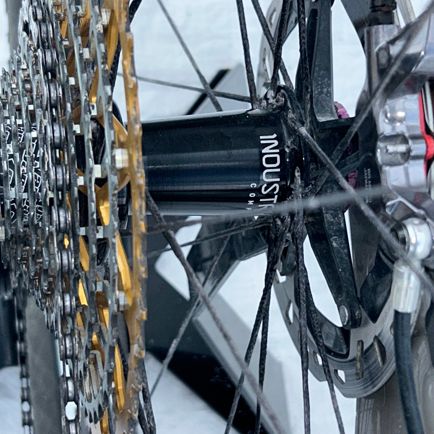 Close-up of a bicycle gear system with 'Shimano' branding.