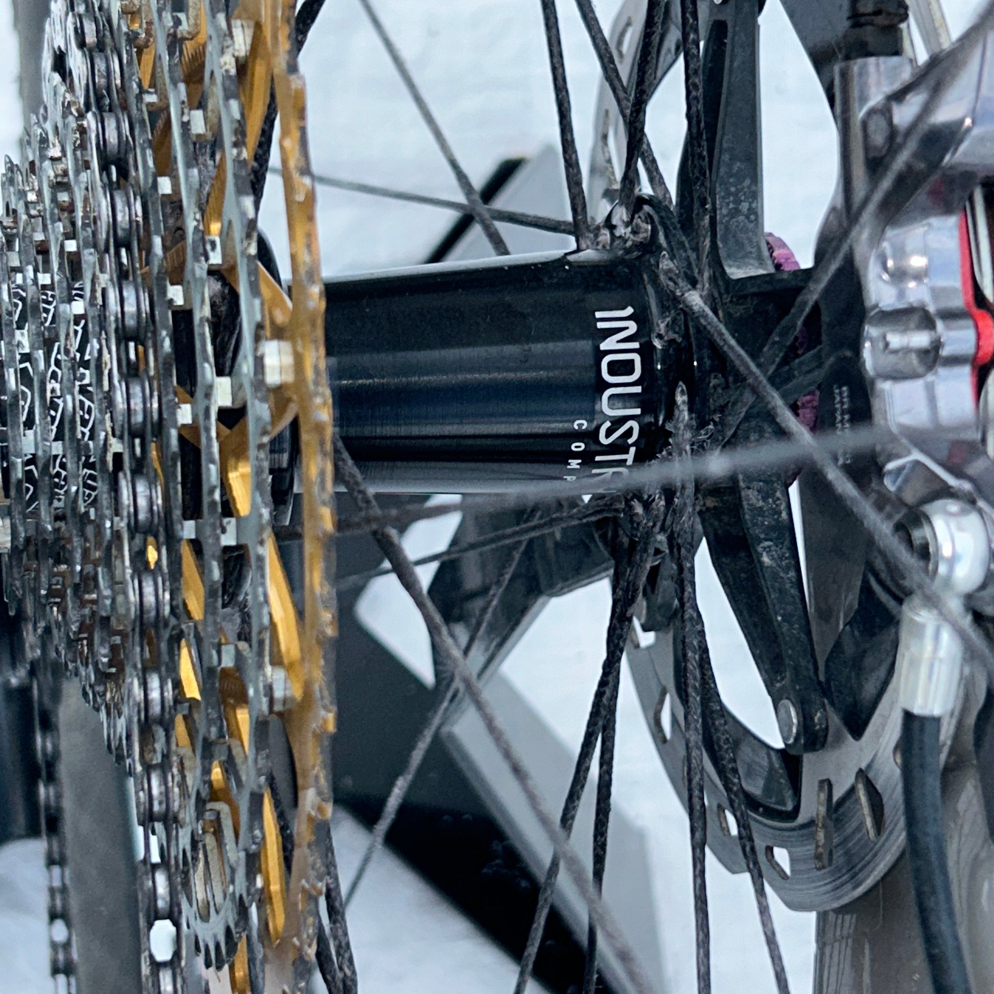 Close-up of a bicycle gear system with 'Shimano' branding.
